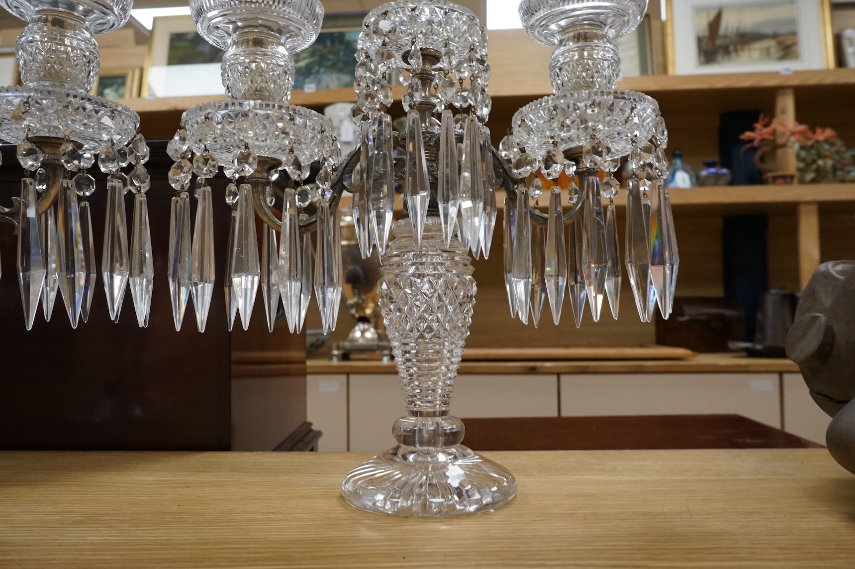 A pair of Victorian cut glass candelabra, probably Perry & Co, in Regency style, for electricity, 38cm